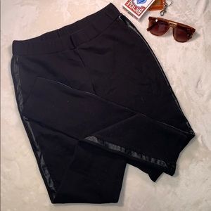 Black leggings with leather strip